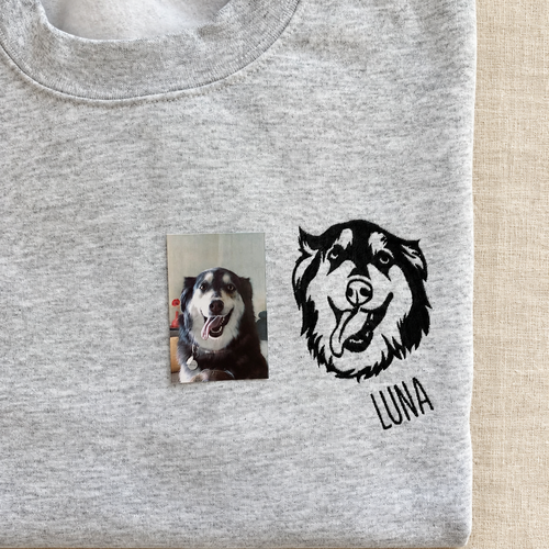 Gray folded shirt with black Luna dog face embroidery and original pet photo