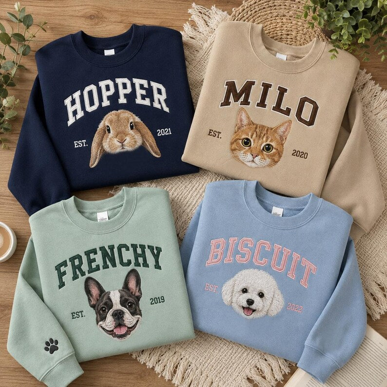 Four colorful pet name and portrait embroidered sweatshirts