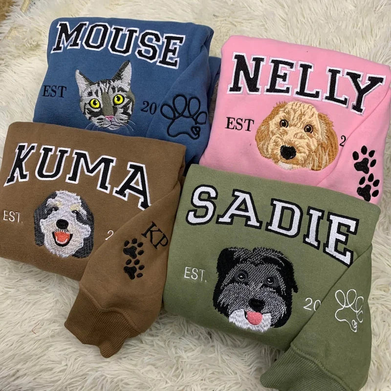 Four pet portrait sweatshirts with varsity names and sleeve designs