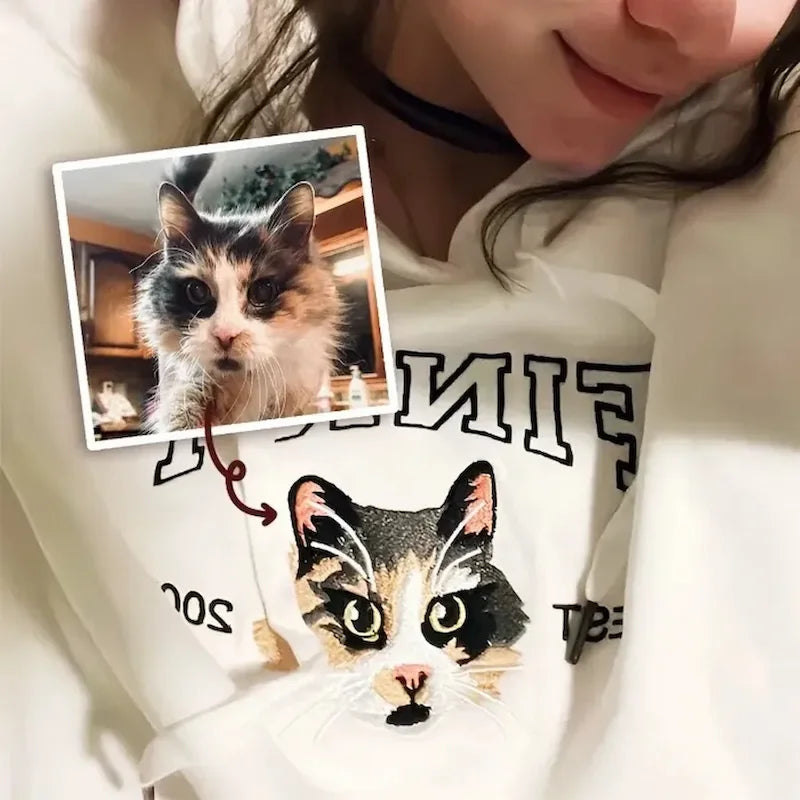 Model wearing cream cat portrait sweatshirt with original pet photo