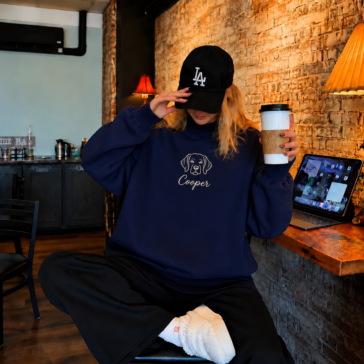Navy mockneck sweatshirt with Cooper dog outline and cream script name