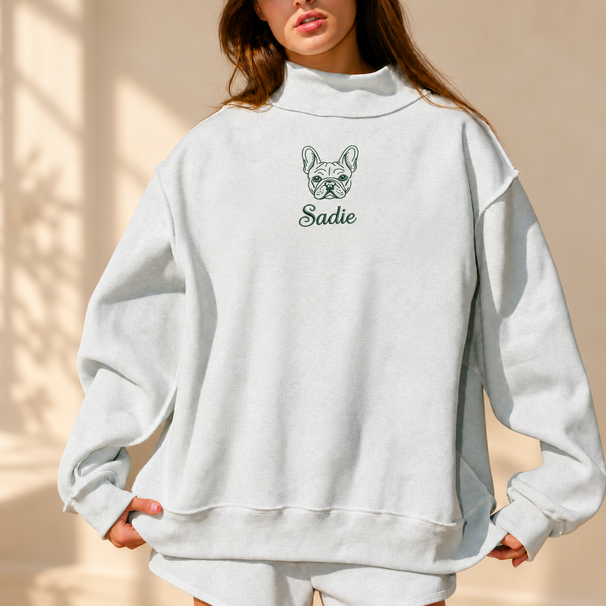 Custom pet outline and name design on a mockneck sweatshirt