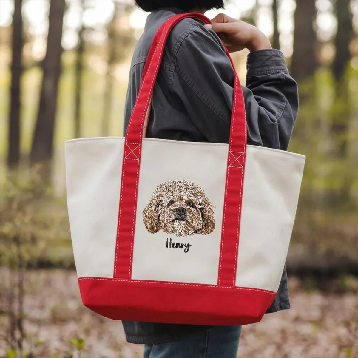 Red and cream tote worn over shoulder with Henry dog portrait