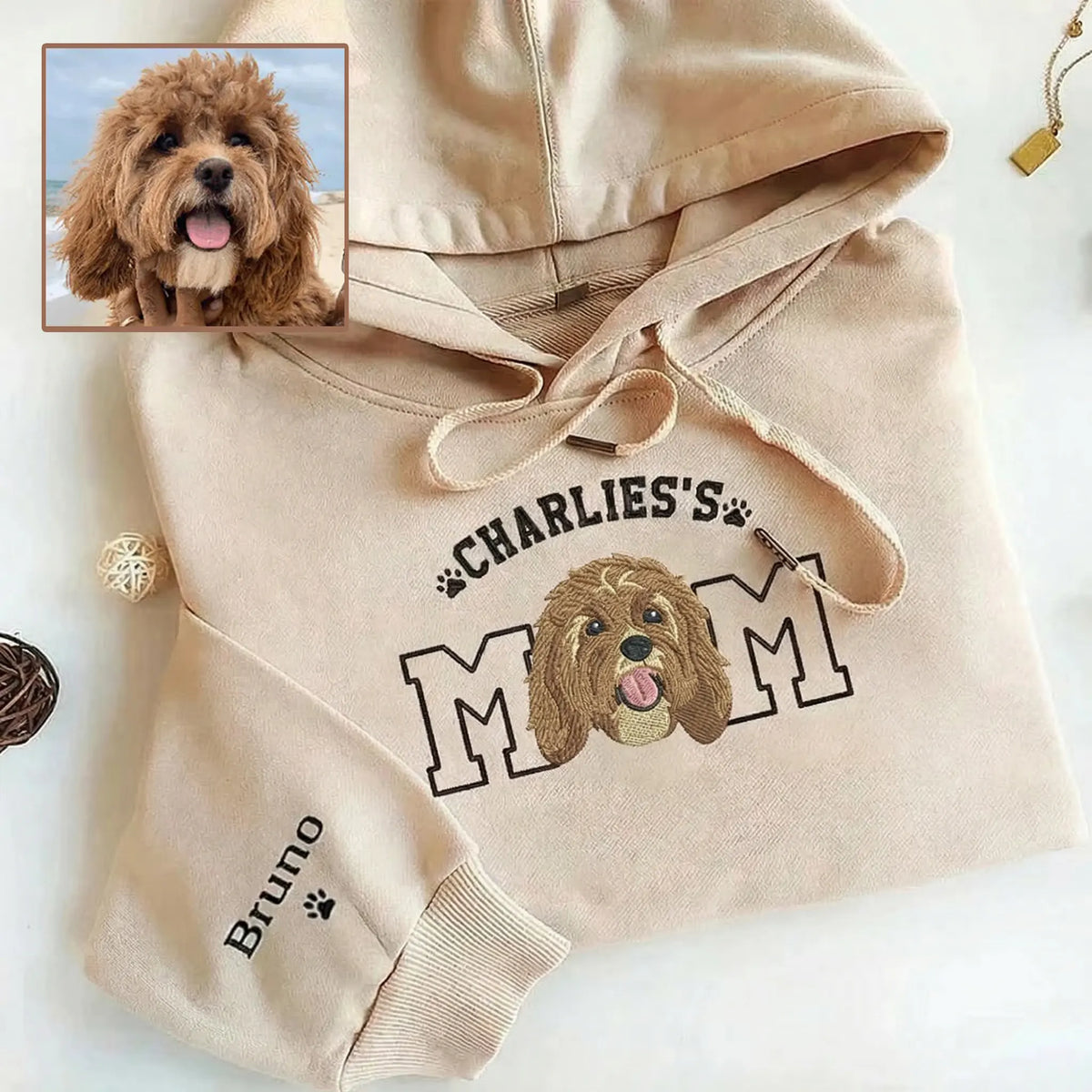 Folded sand hoodie with brown dog MOM portrait and sleeve name