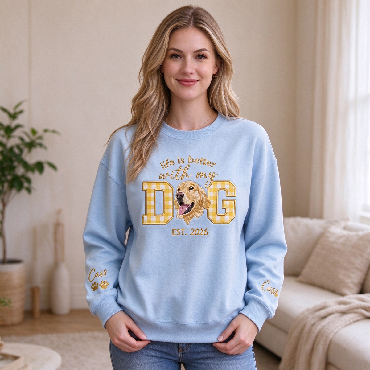Model wearing blue custom dog portrait sweatshirt with yellow gingham letters