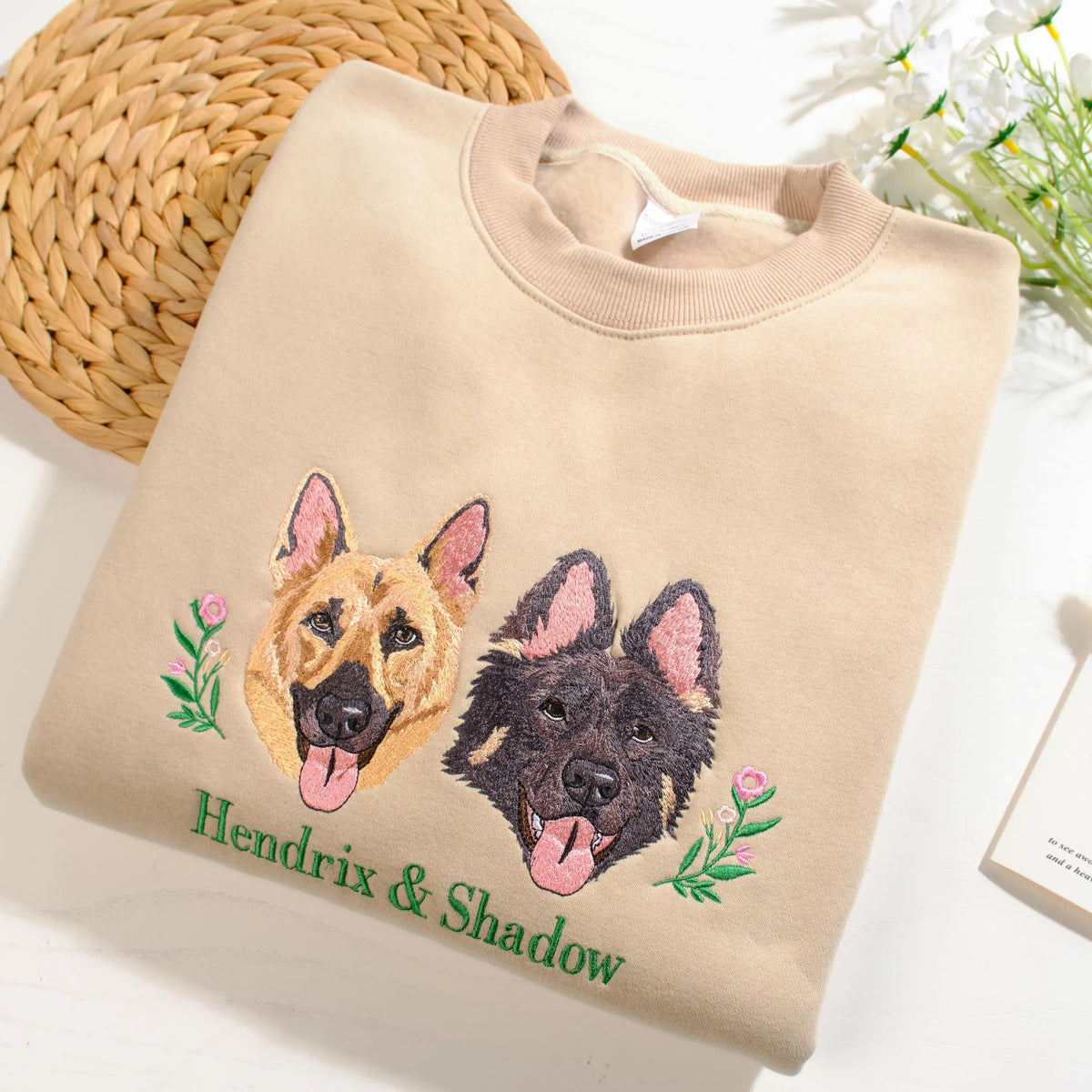 Beige Hendrix and Shadow sweatshirt with two German shepherd portraits and flower sprigs