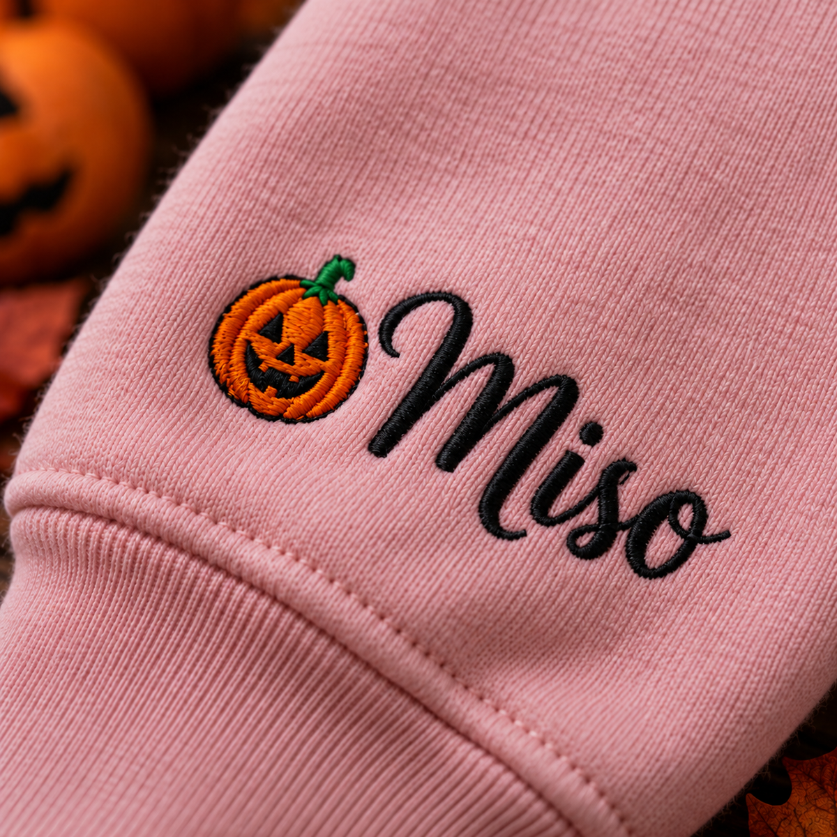 Personalized name embroidery on sweatshirt sleeve