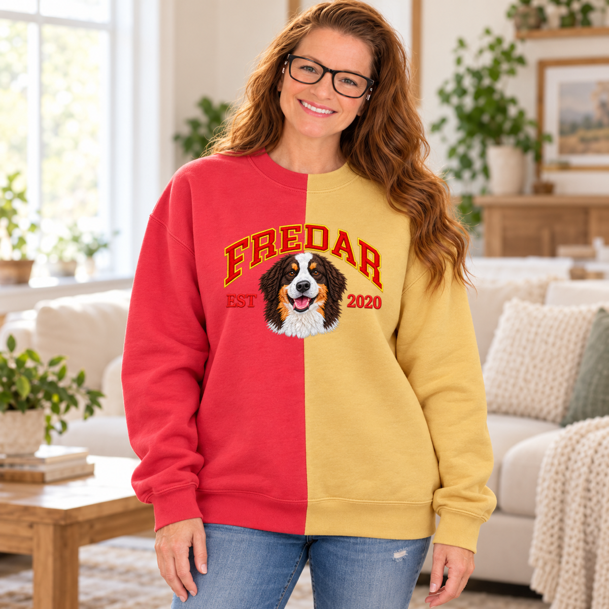 Model wearing coral and mustard split color pet portrait sweatshirt with FREDAR varsity name and EST 2020