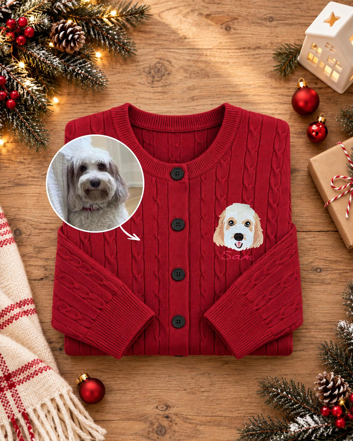Folded red cardigan with small dog portrait embroidery and matching photo inset