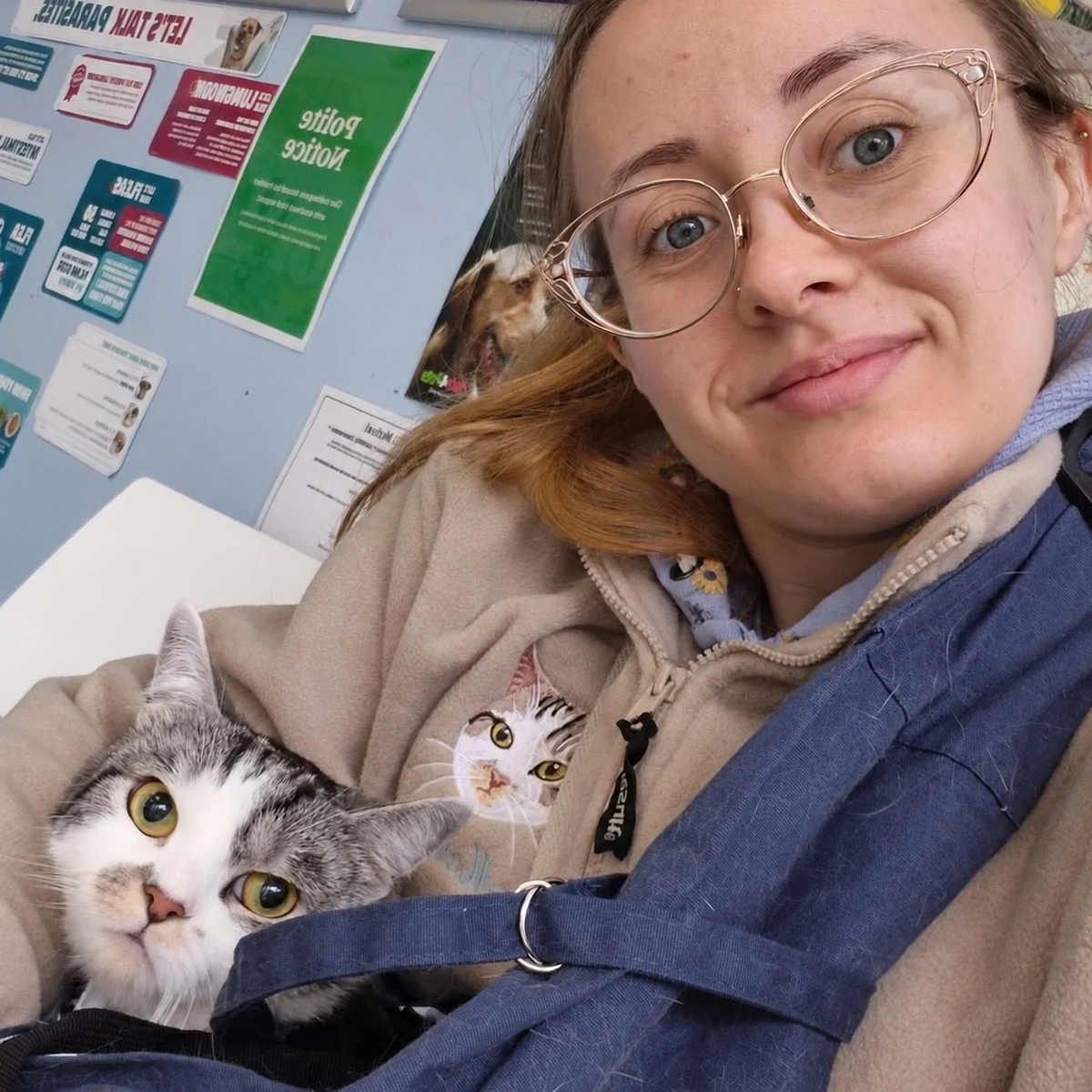 Pet parent and cat with embroidered fleece quarter zip