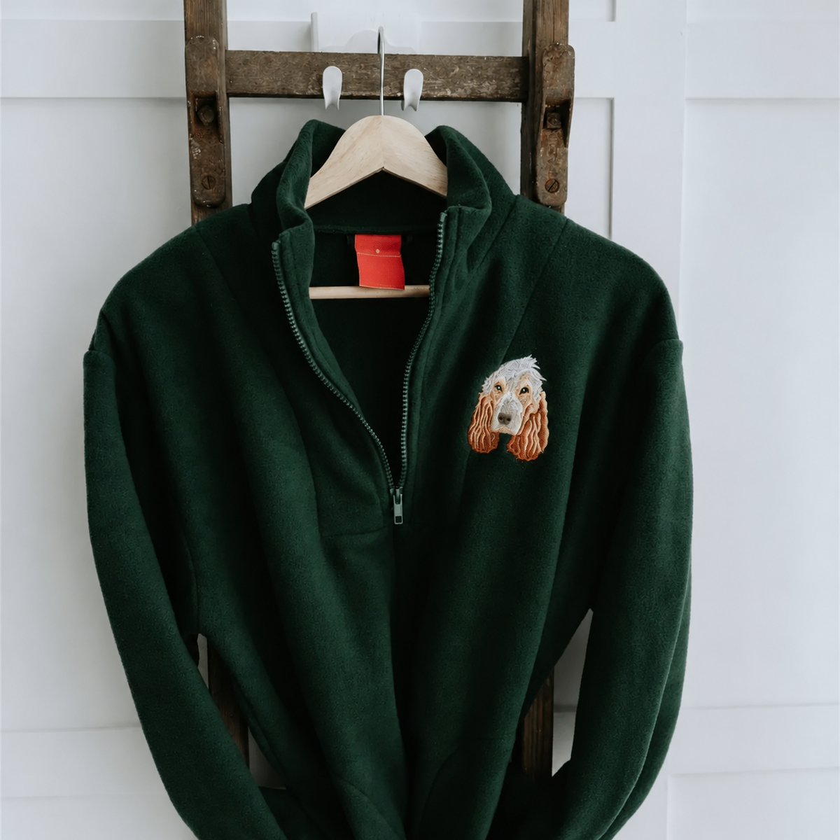 Forest green fleece quarter zip with golden dog portrait