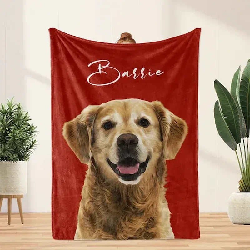 Red Barrie blanket featuring a smiling golden retriever and script name